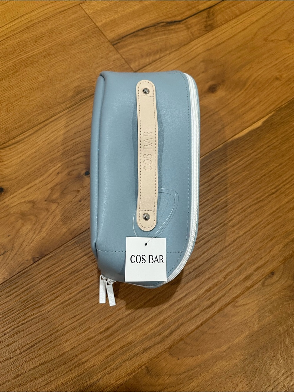Light blue faux leather beautiful cosmetic bag. NWT.